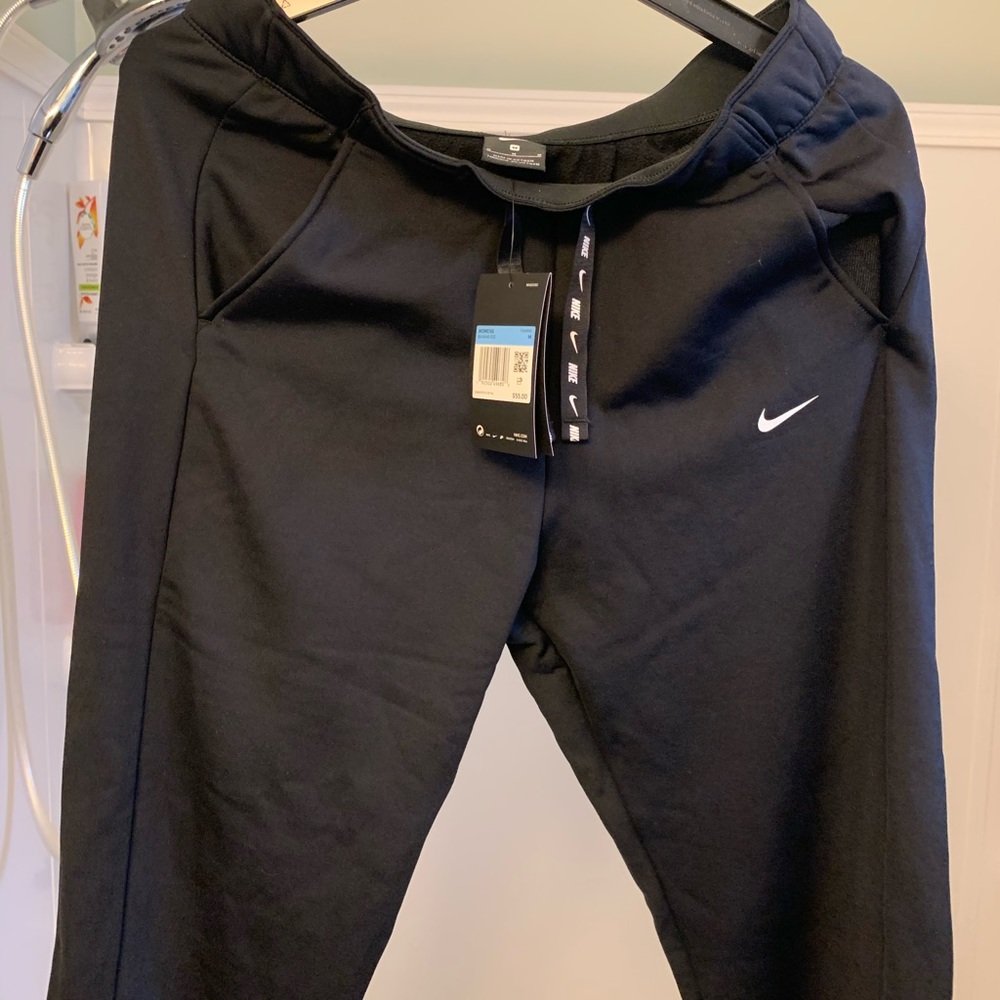 Women’s black nike athletic medium pants with tags